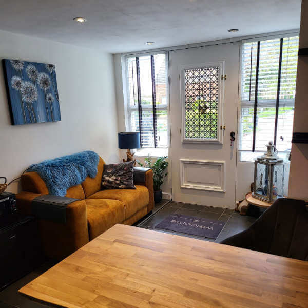 Woonkamer gastenverblijf - Reconnect Woonkamer gastenverblijf - Reconnect